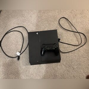 PS4 console with 1 controller and HDMI cord